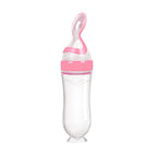 Cuillère distributrice en silicone Mini Miam